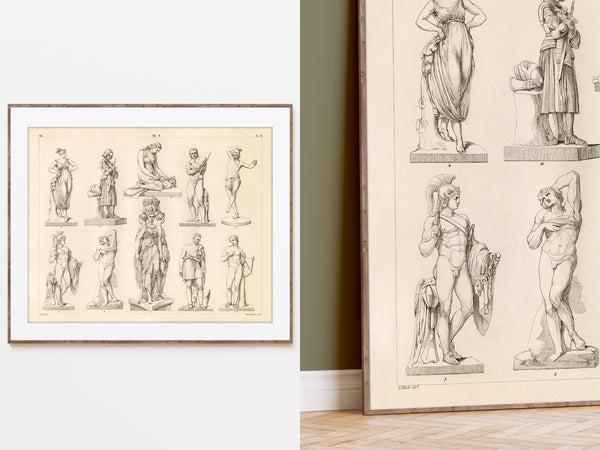 Framed vintage-style art prints featuring classical statue illustrations, shown hanging on a white wall and leaning against a wall in an interior setting.